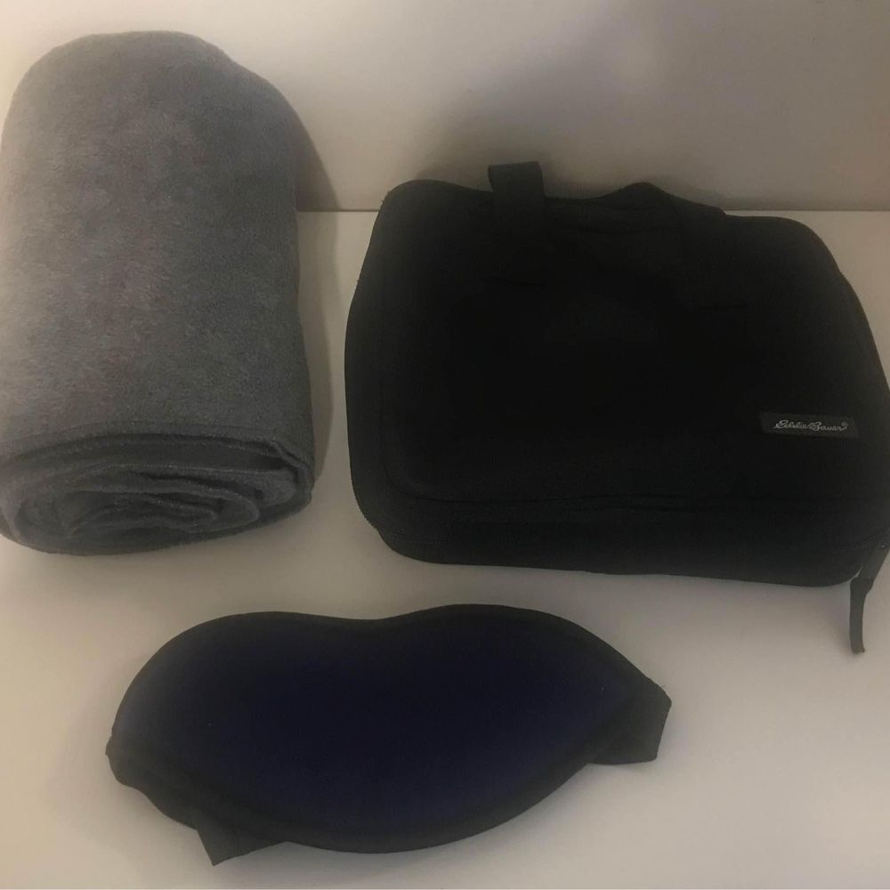 Eddie Bauer travel kit includes case blanket and eye mask for airplane use